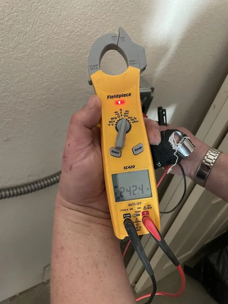 Voltage testing with clamp meter during Generator Installation in Oneonta